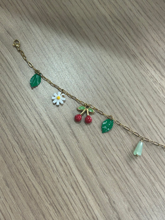 Bracelet cerise défectueux