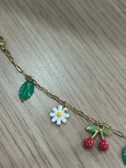 Bracelet cerise défectueux
